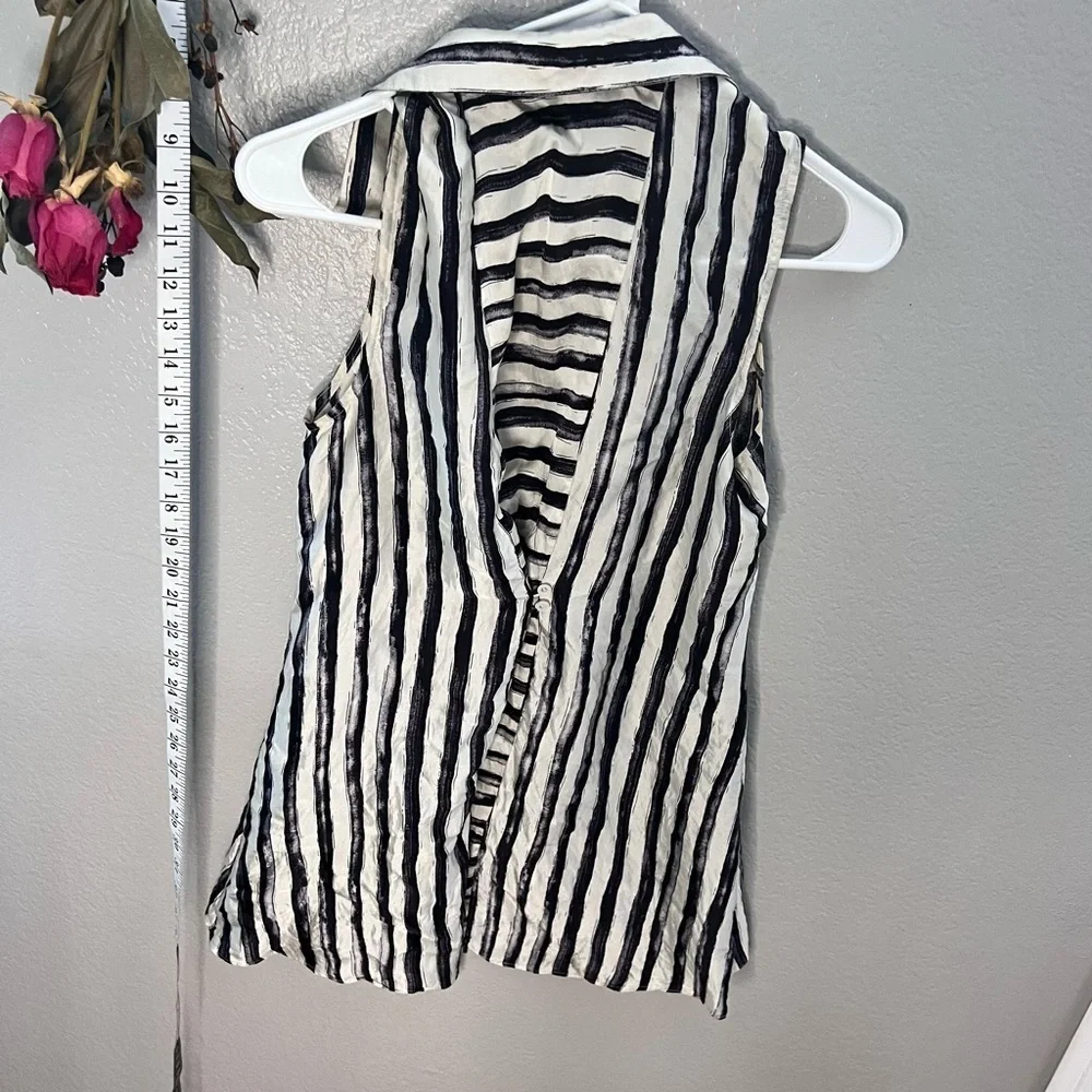 100% silk black|white collared, button-up blouse, size sm-med. short sle…